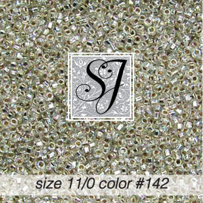 size 11/0 seed beads <br> color #142 Crystal iridescent S/L
