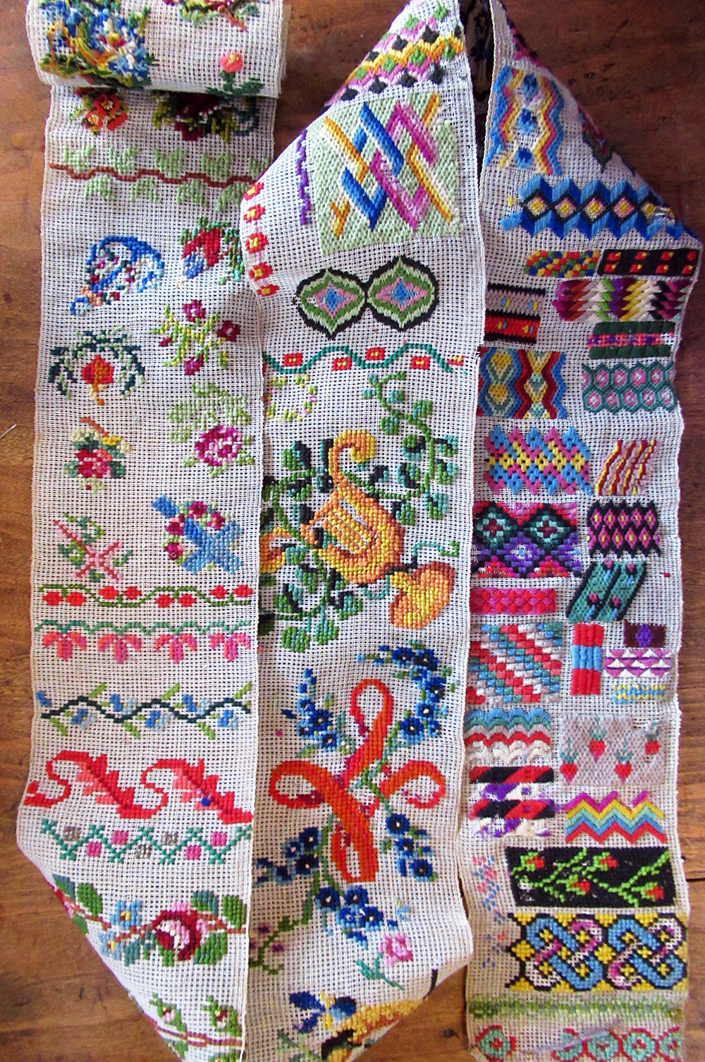 c1850 "Berlin Work" motif sampler 4-3/4 inches wide by 8-1/2 feet long