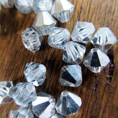 Swarovski 6mm Bicone crystal beads Half Clear, Half Silver