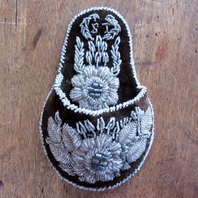 c1900 brown slipper form "Whimsy" watch or wall pocket with clear beads