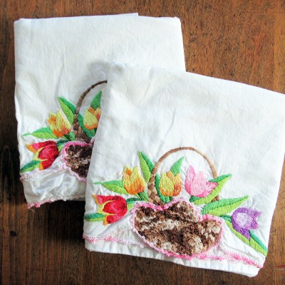 vintage pair hand embroidered & crochet trimmed pillowcases– tulip basket