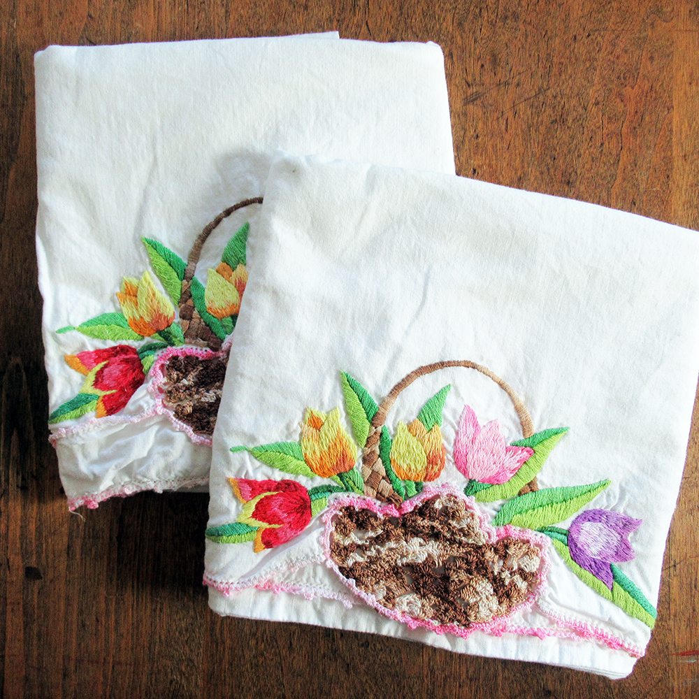 vintage pair hand embroidered & crochet trimmed pillowcases– tulip basket